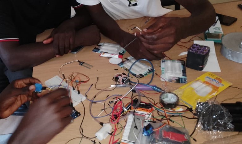 Farmers learning to install soil moisture sensors